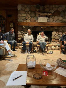 Zahm Retreat group discussion in Land O'Lakes cabin.